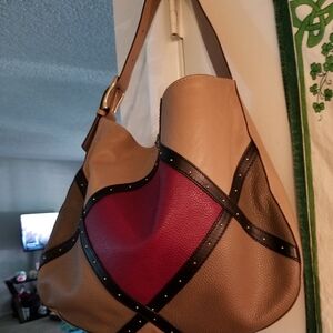 AB A Bellucci beige and maroon leather hobo bag.